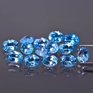 Oválny kameň, kužeľ - topás Swiss Blue 6x4 MM